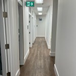 The hallway spanning the length of the office.