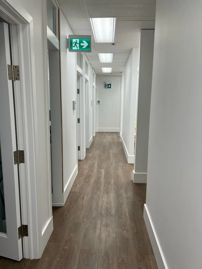The hallway spanning the length of the office.