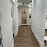 The hallway facing the front door.