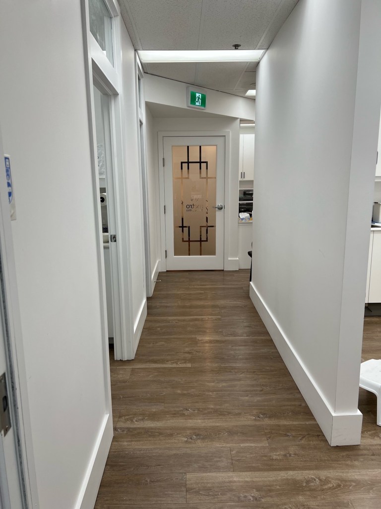 The hallway facing the front door.