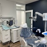 A dental chair wrapped in plastic.